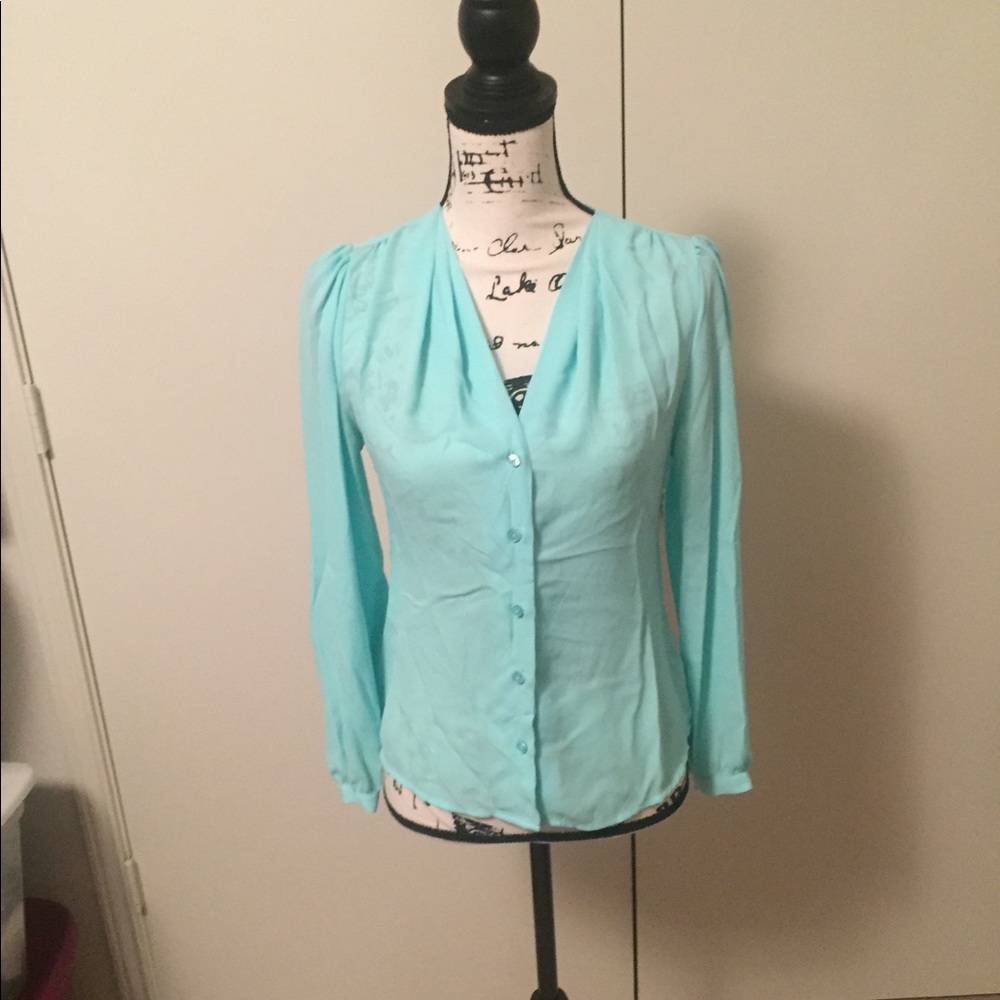 Sheer button up top.
